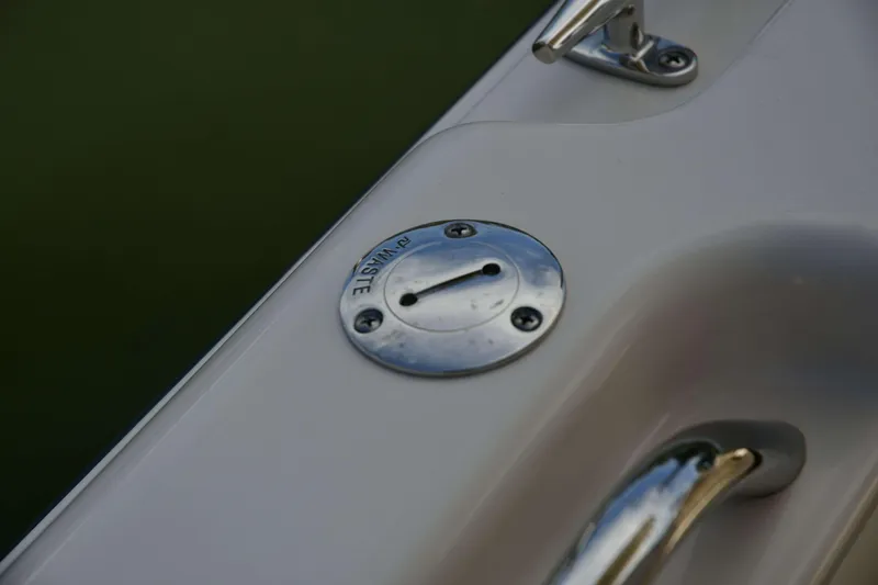Slide: The Image of Close-up of waste cap on 2023 Grady-White Fisherman 257 boat deck. - 20