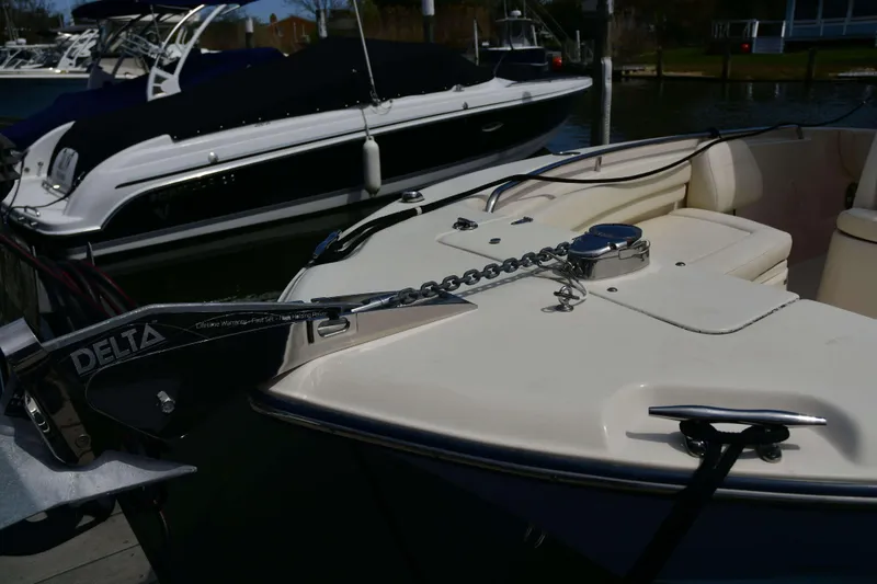 Slide: The Image of 2023 Grady-White Fisherman 257 boat with Delta anchor at marina. - 24