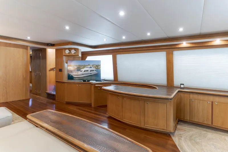 Slide: The Image of Luxurious 1997 Forbes Cooper Pilothouse interior with elegant wood finishes and modern amenities. - 11