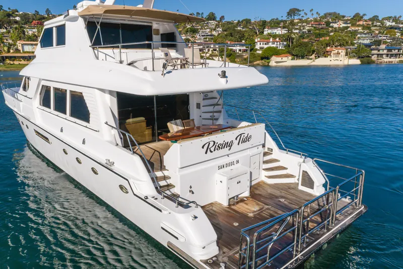 Slide: The Image of Luxury 1997 Forbes Cooper Pilothouse yacht "Rising Tide" on serene water near San Diego. - 3