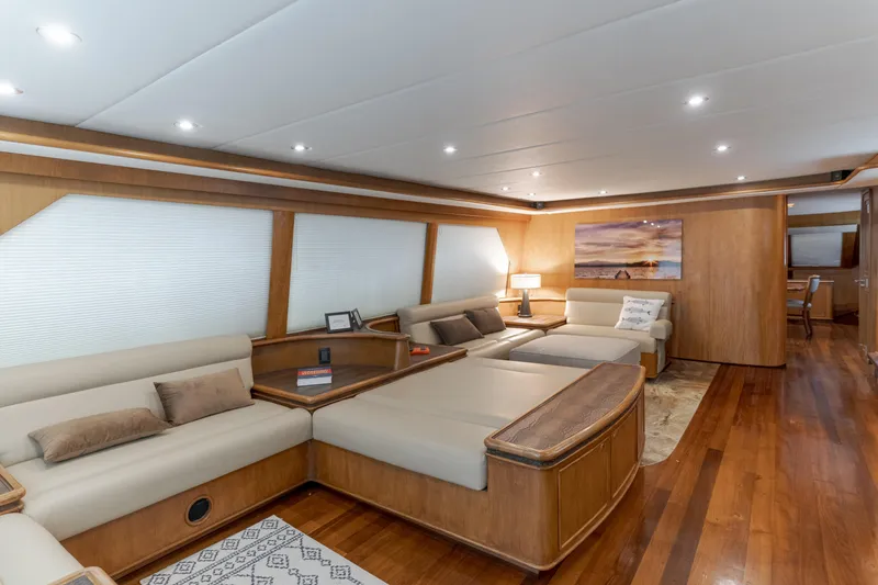 Slide: The Image of Luxurious interior of 1997 Forbes Cooper Pilothouse yacht with elegant wood finishes and plush seating. - 9