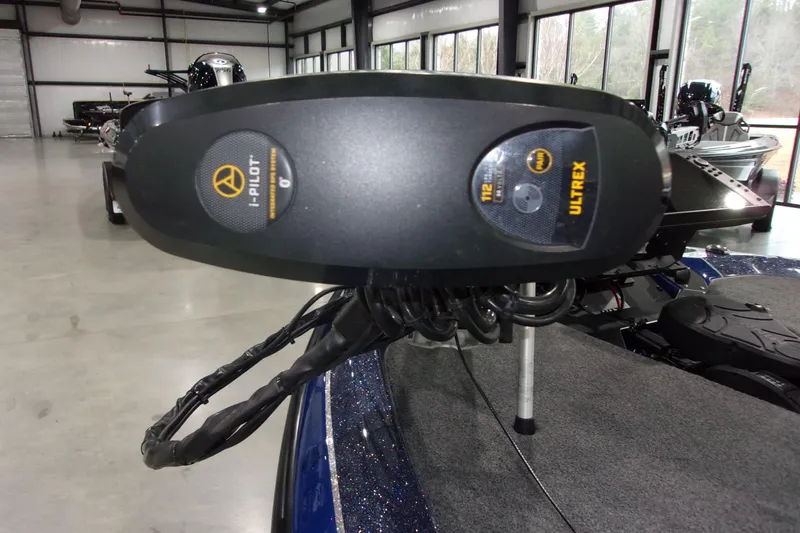 Slide: The Image of 2020 Skeeter ZXR21 boat with i-Pilot Ultrex trolling motor in a showroom. - 6