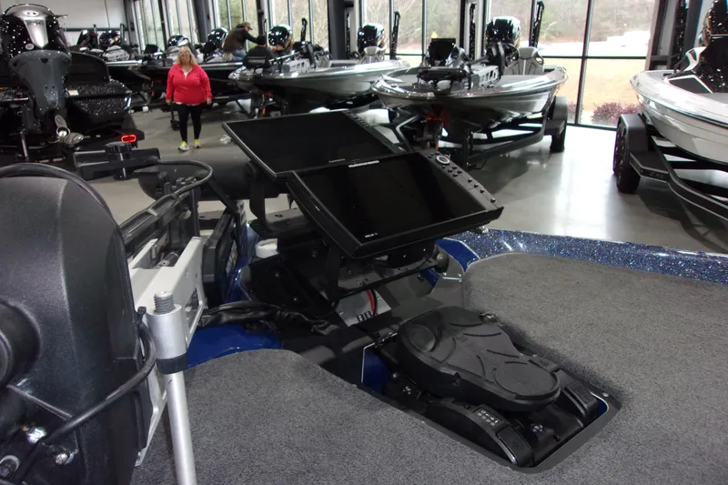 Slide: The Image of 2020 Skeeter ZXR21 boat interior with advanced navigation system in showroom. - 7