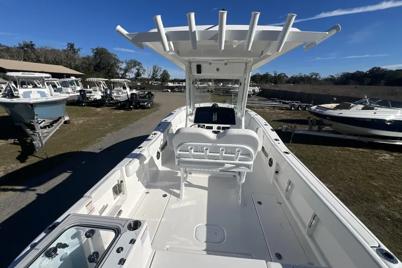 The Image of 2026 Sea Fox 268 Commander boat interior with helm and seating, displayed outdoors. - 1