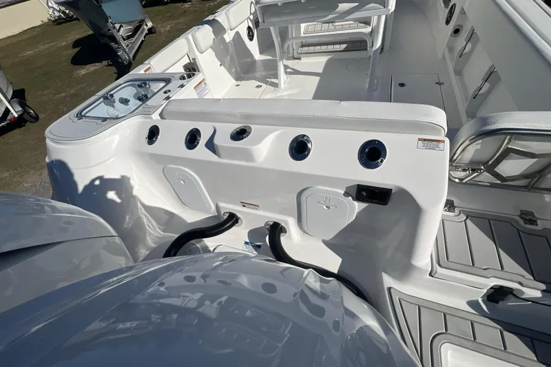 Slide: The Image of 2026 Sea Fox 268 Commander boat interior with seating and control panel. - 11