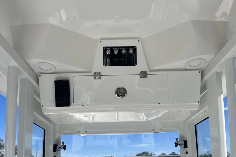Slide: The Image of 2026 Sea Fox 268 Commander boat interior with control panel and storage. - 7