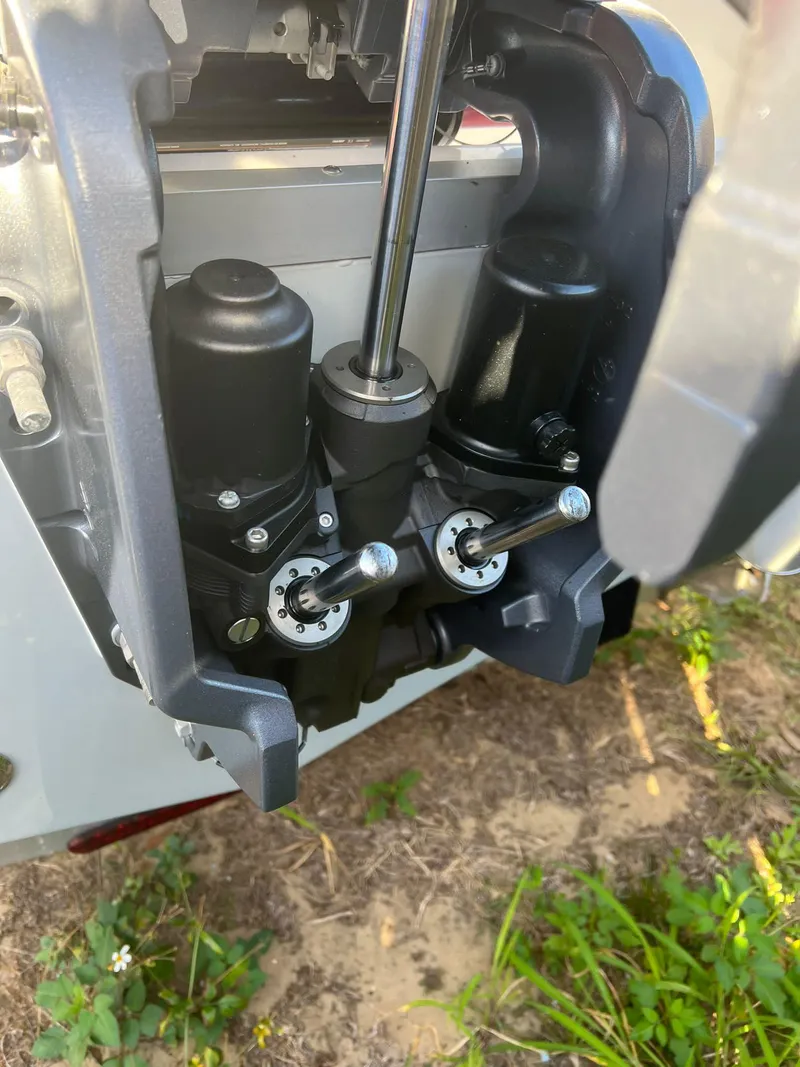 Slide: The Image of Close-up of a 2022 Sea Hunt Ultra 229 boat engine. - 11