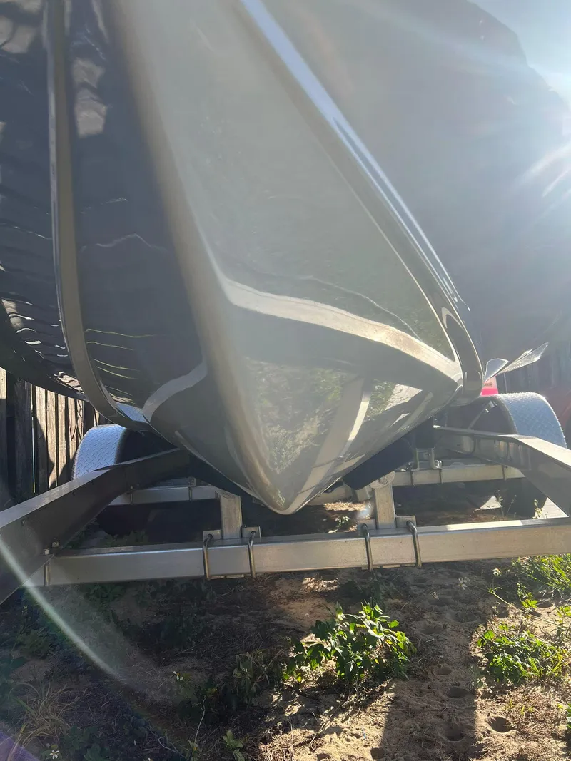 Slide: The Image of Sea Hunt Ultra 229 boat hull on trailer, 2022 model. - 6