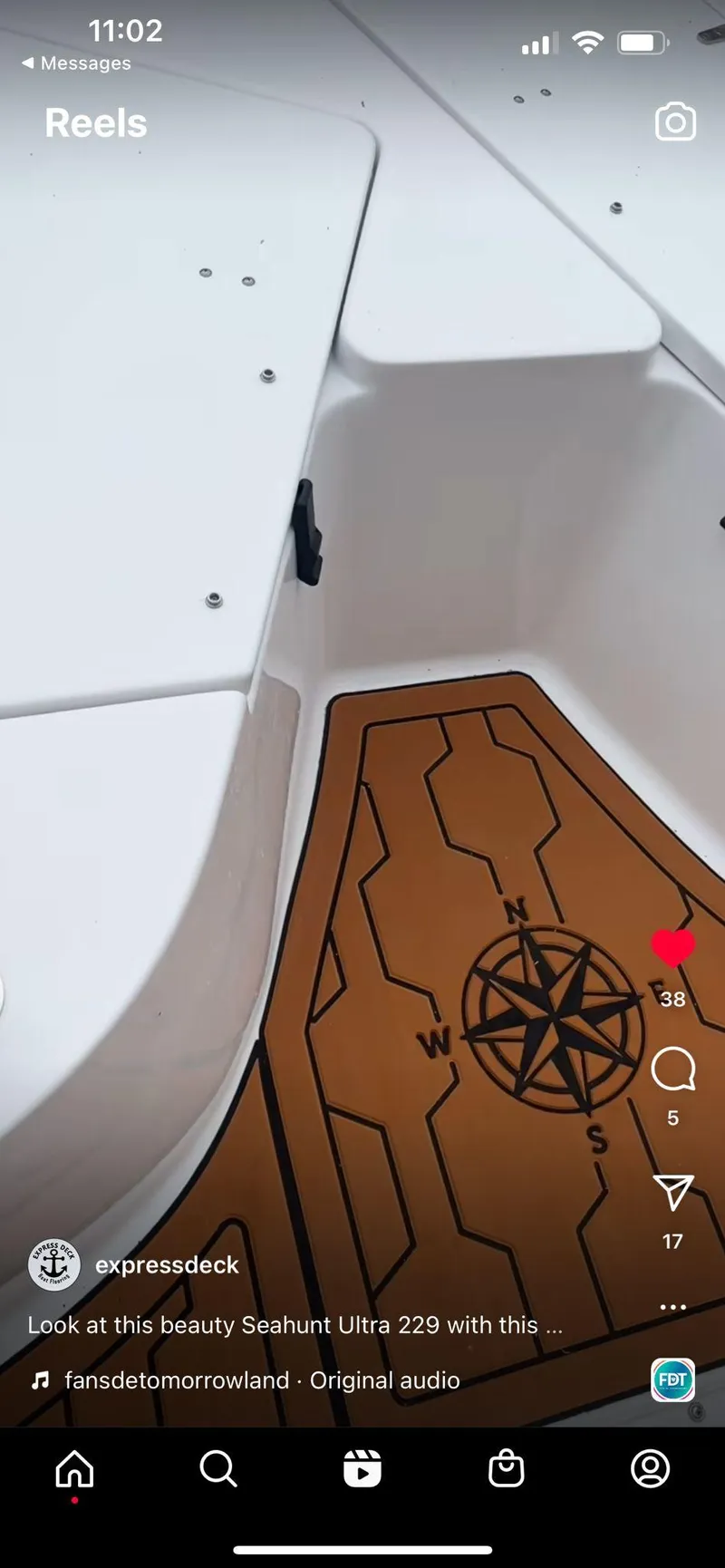 Slide: The Image of 2022 Sea Hunt Ultra 229 boat interior with compass design. - 9