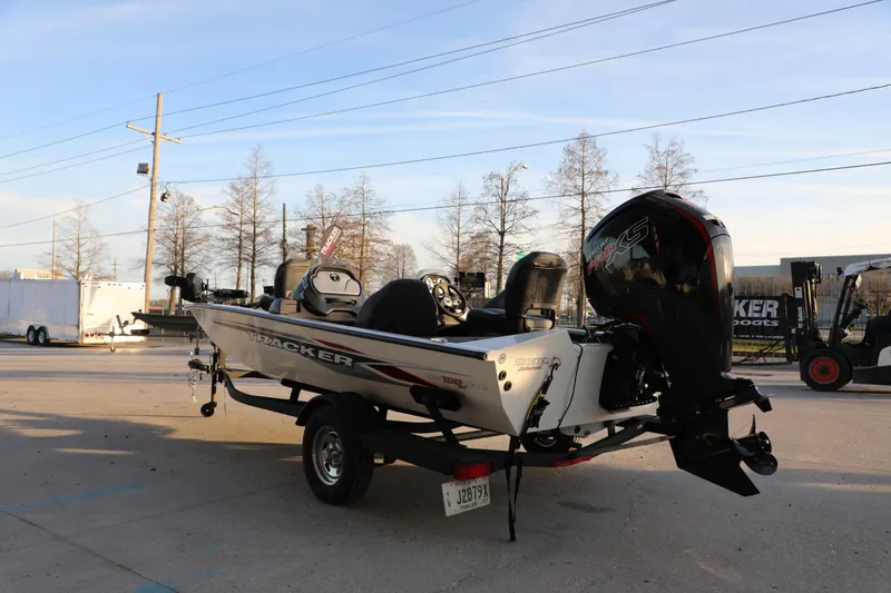 Slide: The Image of 2024 Bass Tracker PRO TEAM 190 boat on trailer, outdoor setting. - 4