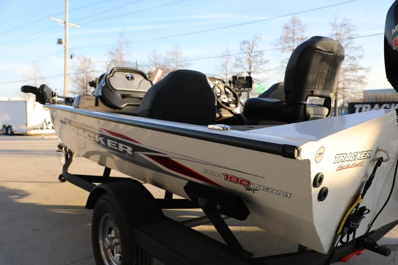 Slide: The Image of 2024 Bass Tracker PRO TEAM 190 boat on trailer, side view in outdoor setting. - 7