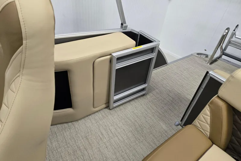 Slide: The Image of Interior of 2026 Godfrey Monaco 215 C pontoon boat with beige seating and carpeted flooring. - 13