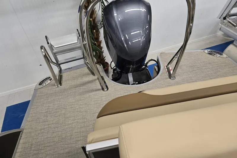 Slide: The Image of 2026 Godfrey Monaco 215 C boat with motor and seating area. - 16