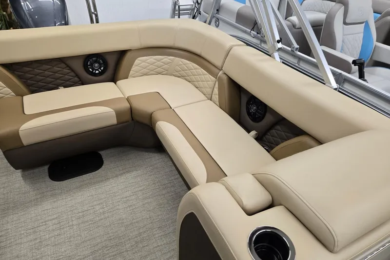Slide: The Image of Luxurious seating in 2026 Godfrey Monaco 215 C boat with beige and brown upholstery. - 6