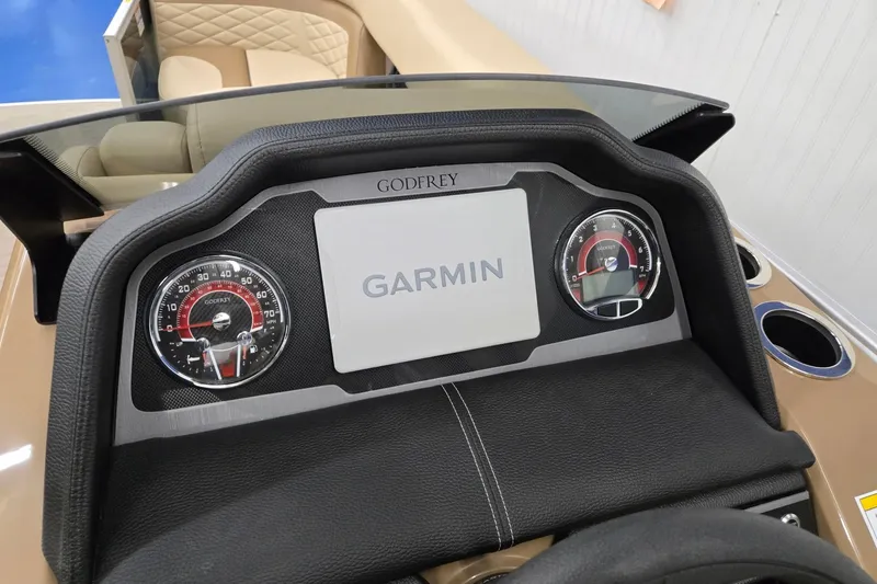 Slide: The Image of Dashboard of 2026 Godfrey Monaco 215 C with Garmin display and gauges. - 9