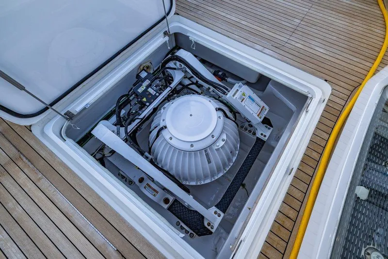 Slide: The Image of Engine compartment of 2022 Viking 72 Convertible yacht, showcasing advanced machinery. - 36