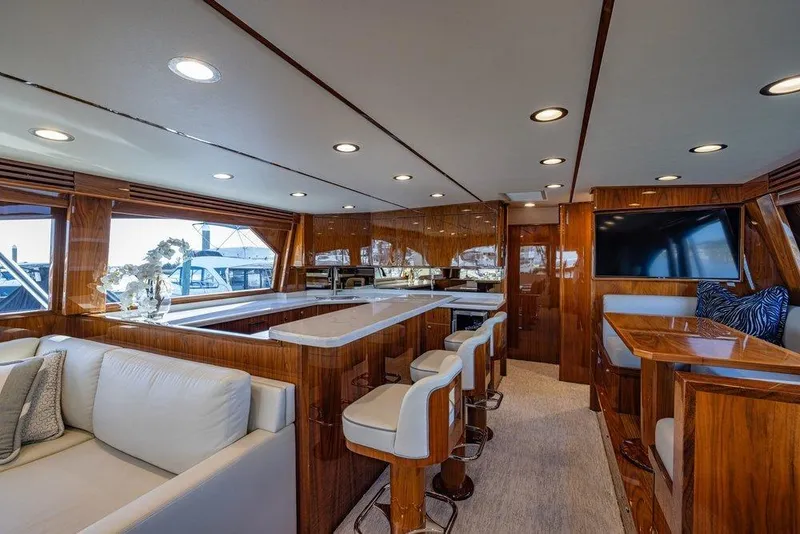Slide: The Image of Luxurious interior of 2022 Viking 72 Convertible yacht with elegant seating and modern amenities. - 37