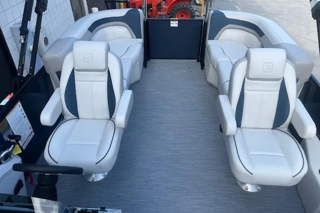 Slide: The Image of 2026 Godfrey Sweetwater 2286 SB boat interior with plush seating and modern design. - 11