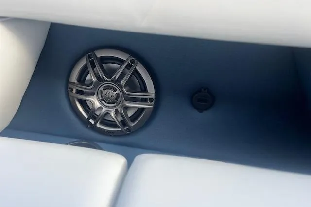 Slide: The Image of Speaker and outlet on 2026 Godfrey Sweetwater 2286 SB boat interior. - 15