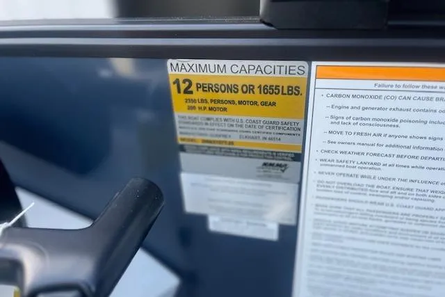 Slide: The Image of Maximum capacity label on 2026 Godfrey Sweetwater 2286 SB boat, 12 persons or 1655 lbs. - 18