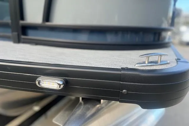 Slide: The Image of 2026 Godfrey Sweetwater 2286 SB boat detail with cleat and light. - 7