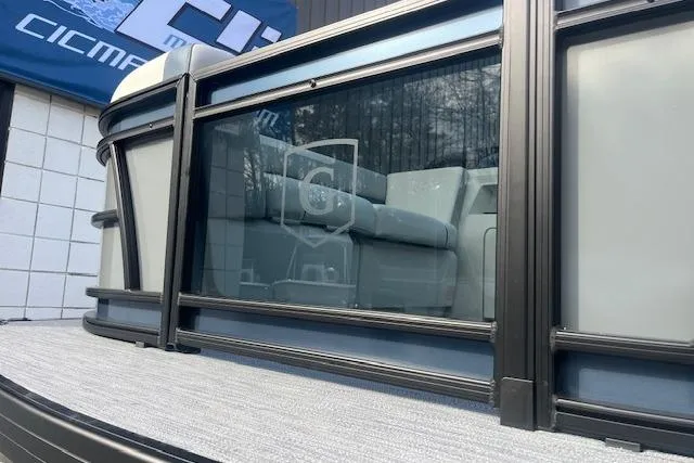 Slide: The Image of 2026 Godfrey Sweetwater 2286 SB pontoon boat with sleek design and comfortable seating. - 8