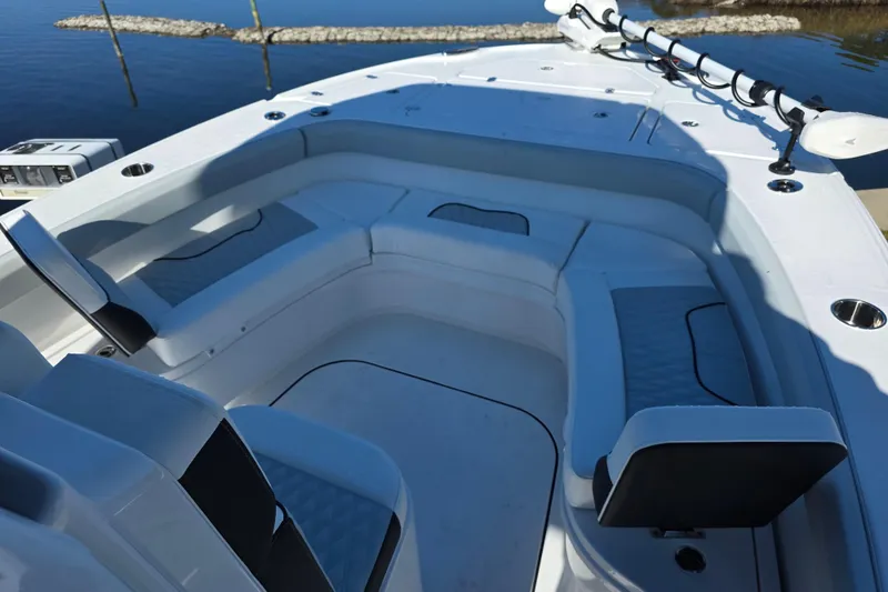 Slide: The Image of 2026 Blackfin 262 HB boat interior with cushioned seating and sleek design. - 10