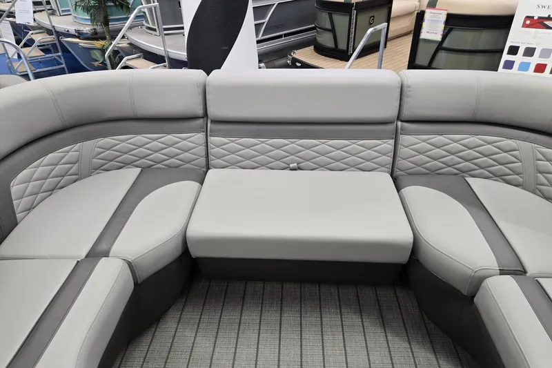 Slide: The Image of Luxurious seating on 2026 Godfrey Monaco 235 QSB pontoon boat with quilted upholstery. - 10