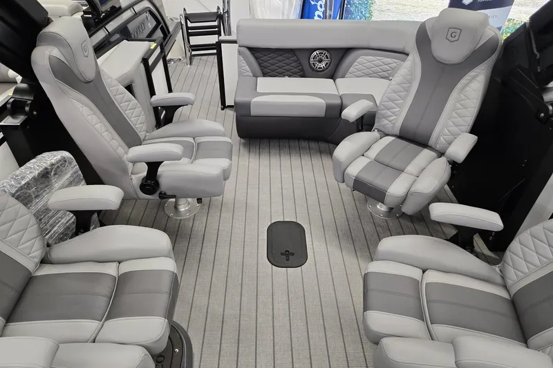 Slide: The Image of Luxurious interior of 2026 Godfrey Monaco 235 QSB pontoon boat with plush seating. - 13