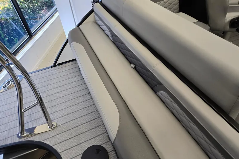 Slide: The Image of 2026 Godfrey Monaco 235 QSB boat interior with sleek seating and modern design. - 27