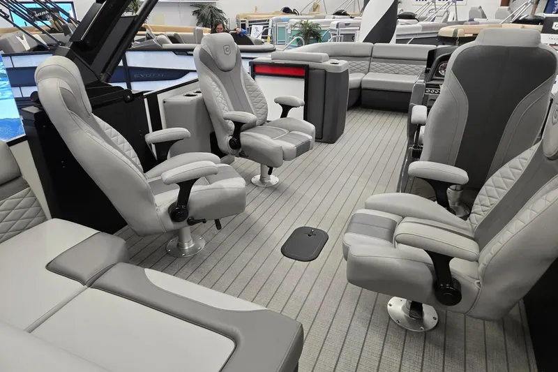 Slide: The Image of Luxurious interior of 2026 Godfrey Monaco 235 QSB pontoon boat with plush seating. - 28