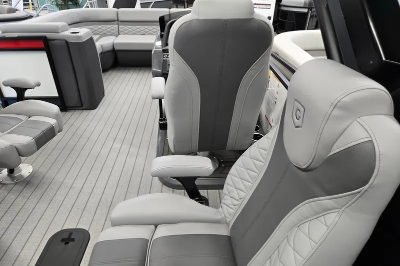 Slide: The Image of Luxurious interior of 2026 Godfrey Monaco 235 QSB pontoon boat with plush seating. - 30