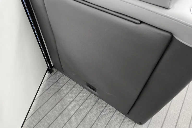 Slide: The Image of Interior detail of 2026 Godfrey Monaco 235 QSB boat, featuring sleek seating and flooring. - 33