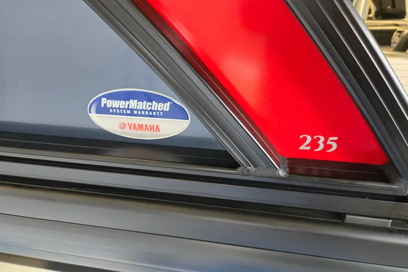 Slide: The Image of Close-up of 2026 Godfrey Monaco 235 QSB with Yamaha PowerMatched warranty badge. - 37