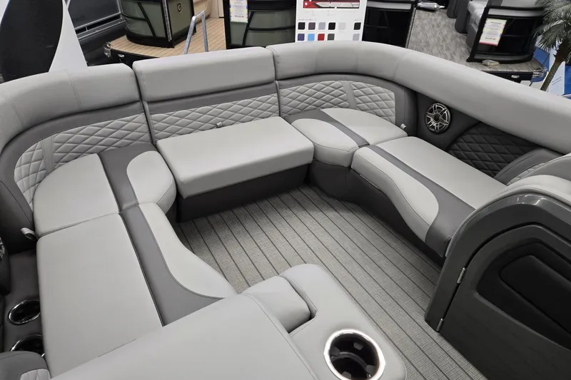 Slide: The Image of Luxurious seating area of 2026 Godfrey Monaco 235 QSB pontoon boat with quilted upholstery. - 7