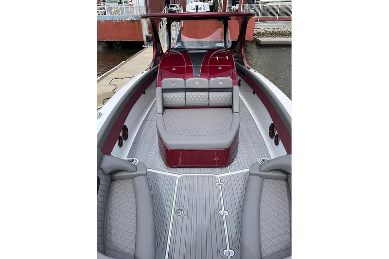 Slide: The Image of 2021 Mystic Powerboats M3800 interior with luxurious seating and sleek design. - 10