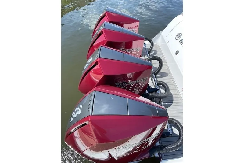 Slide: The Image of Four red Mercury Racing outboard engines on a 2021 Mystic Powerboats M3800. - 17