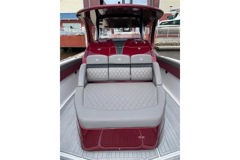 Slide: The Image of 2021 Mystic Powerboats M3800 interior with luxurious seating and elegant design. - 20