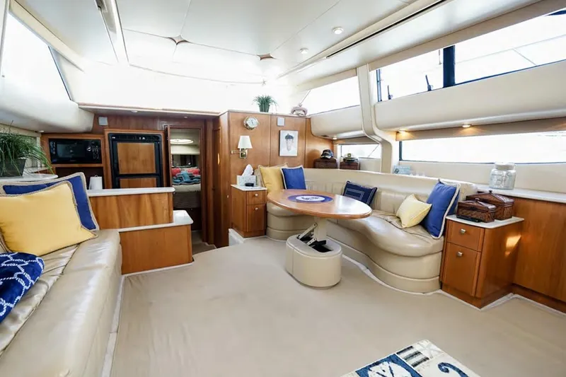 Slide: The Image of Luxurious interior of 2004 Meridian 459 Motoryacht with plush seating and elegant decor. - 11