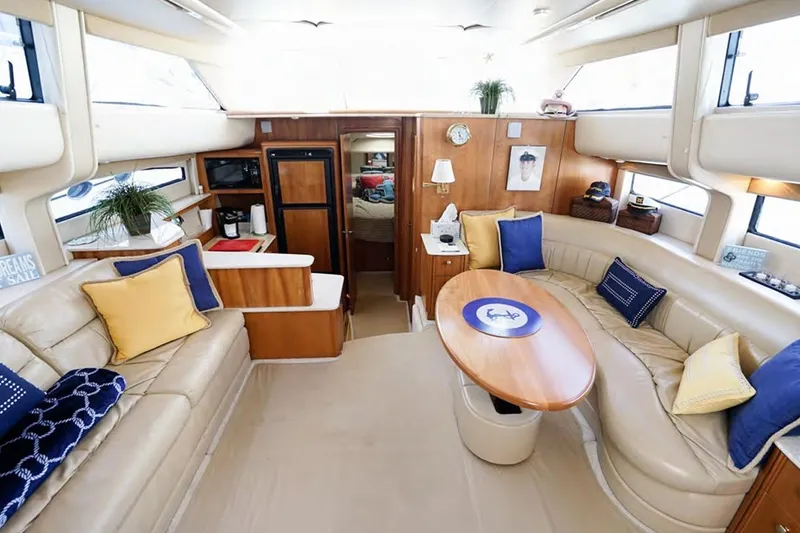 Slide: The Image of Luxurious interior of 2004 Meridian 459 Motoryacht with plush seating and elegant decor. - 12