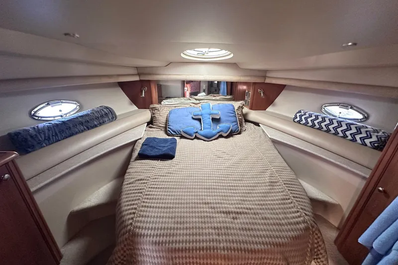 Slide: The Image of Luxurious cabin interior of 2004 Meridian 459 Motoryacht with nautical decor. - 14