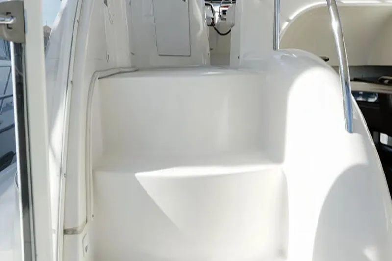 Slide: The Image of Staircase on 2004 Meridian 459 Motoryacht, featuring sleek white design and stainless steel handrails. - 16