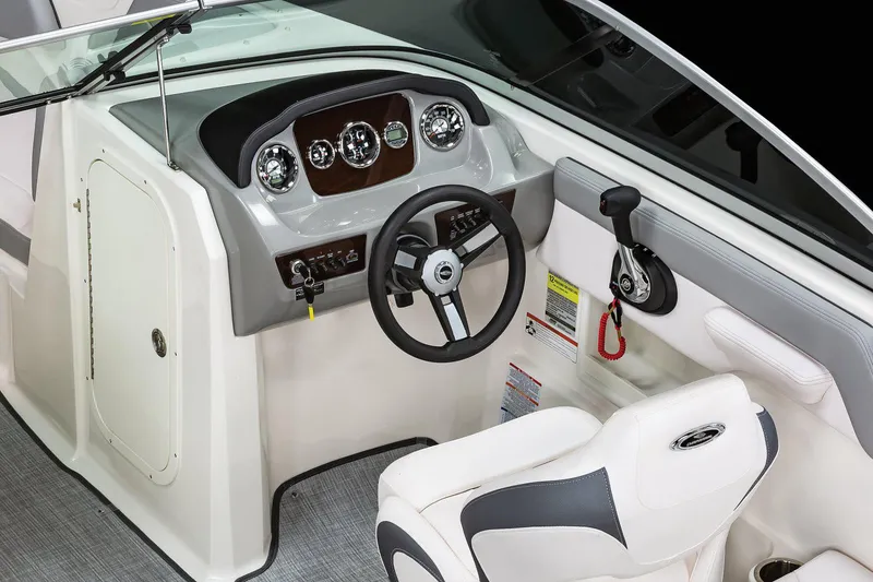 Slide: The Image of Manufacturer Provided Image: 2020 Chaparral 23 SSi boat cockpit with steering wheel and control panel. - 17