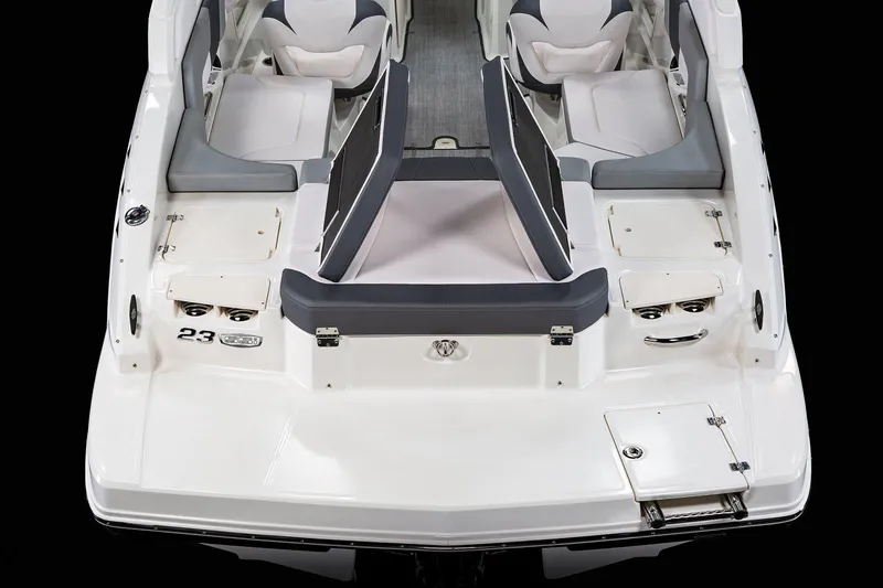 Slide: The Image of Manufacturer Provided Image: 2020 Chaparral 23 SSi boat interior, rear view with seating and storage compartments. - 24