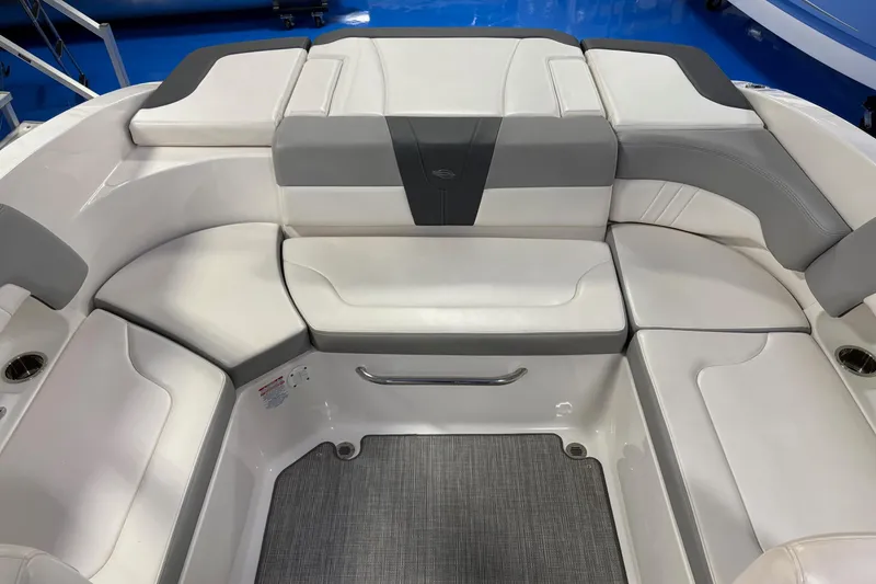 Slide: The Image of 2020 Chaparral 23 SSi boat interior with white and gray seating arrangement. - 5