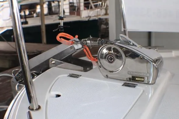 Slide: The Image of 2020 Ranger Tugs R-27 boat anchor winch system on deck, featuring stainless steel components. - 18