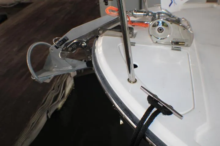 Slide: The Image of Bow of 2020 Ranger Tugs R-27 with anchor and cleat. - 19