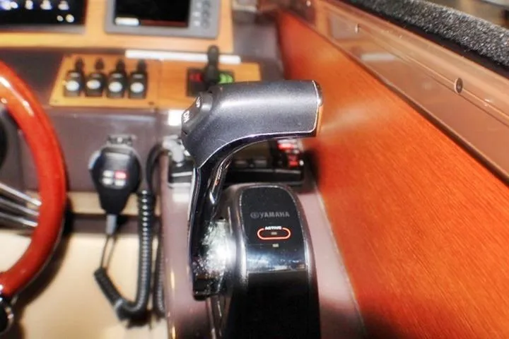 Slide: The Image of Control panel of 2020 Ranger Tugs R-27 boat with Yamaha throttle. - 52