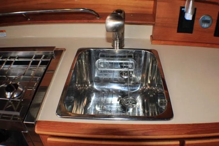 Slide: The Image of Stainless steel sink in 2020 Ranger Tugs R-27 boat kitchen area. - 69