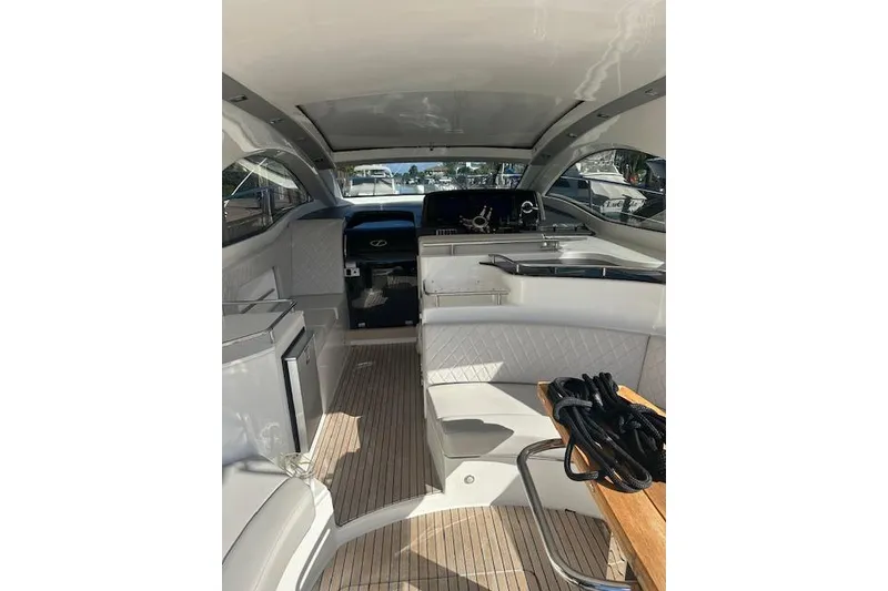 Slide: The Image of 2023 Schaefer 400 yacht interior with modern seating and sleek design. - 45